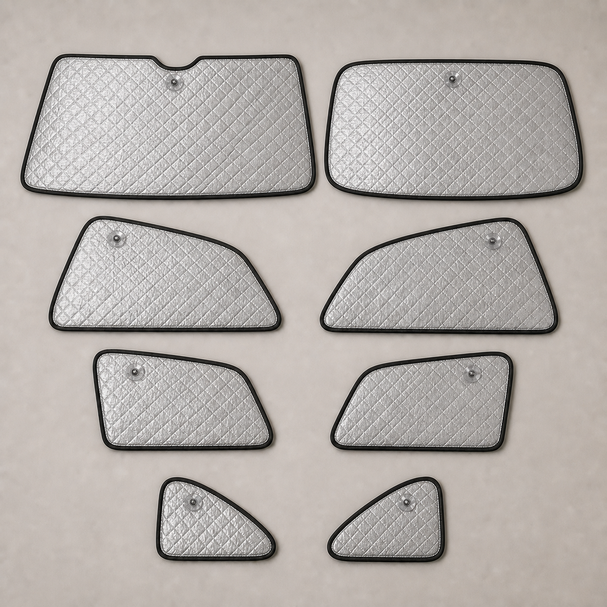 Eight separate custom-shaped full-cabin blackout shade panels