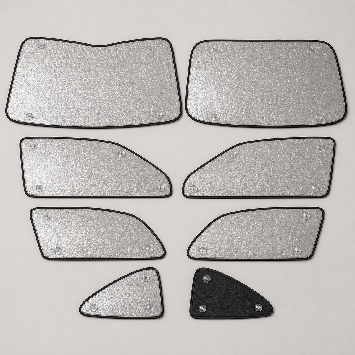 Eight separate custom-shaped full-cabin blackout shade panels