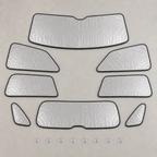 Eight separate custom-shaped full-cabin blackout shade panels