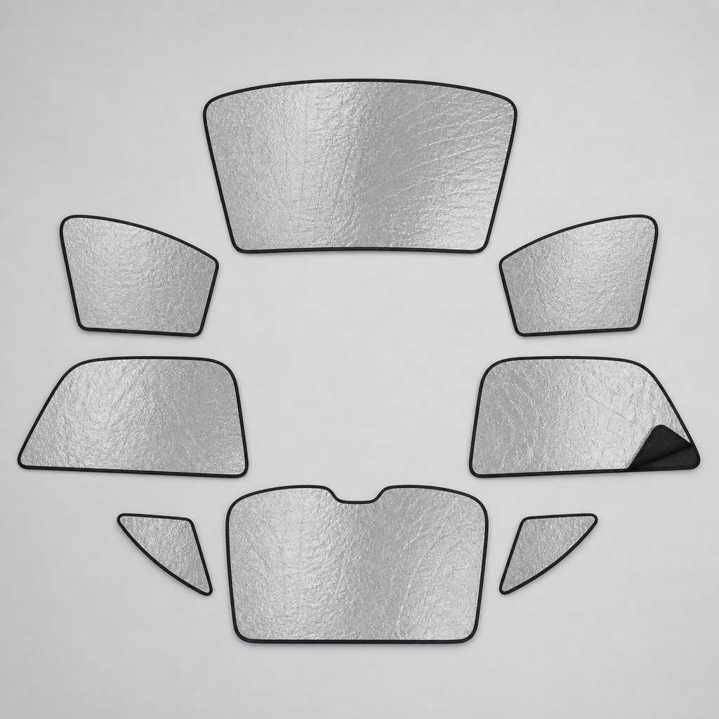 Eight separate custom-shaped full-cabin blackout shade panels