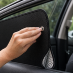Clear suction-cup mounting detail on a bound blackout panel