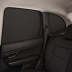 Fitted blackout panel aligned with a side-window opening
