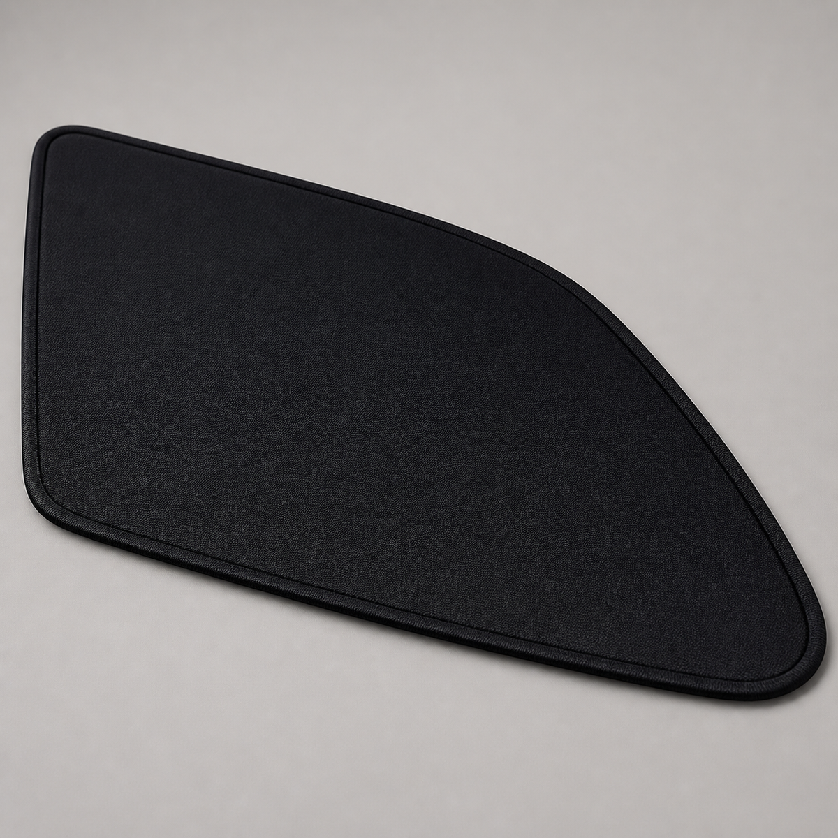 Close view of a dark blackout panel contour and bound edge
