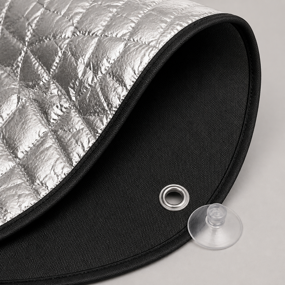 Silver exterior and black cabin-facing blackout material detail