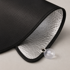 Silver exterior and black cabin-facing blackout material detail